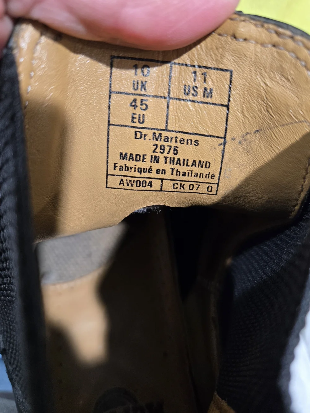 These boots are the iconic Dr. Martens 2976 Chelsea Boots